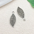 Set of two antique silver leaf alloy charms with hollow vein details and top loops - Long Leaf / 10x26mm