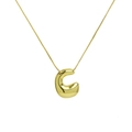 Macro shot of 18K gold plated puffy bubble letter C pendant on a delicate chain - Gold C