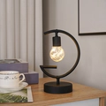 G-shaped black metal table lamp with Edison LED bulb and warm light on a wooden table - Black G-Shaped Table Lamp / Warm Light-Battery Type