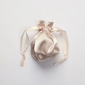 Soft light pink satin drawstring storage bag with silky smooth texture and ribbon closure - Champagne Pink