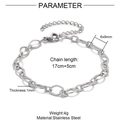 Macro detail of silver stainless steel paperclip chain with textured links and lobster clasp - 1.0mm Cat Eye Cross Embossed / Steel