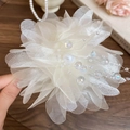 Detail of elegant white mesh flower hair clip with pearls and iridescent bead accents - Organza/Acrylic/Faux Pearl / Large Flower Style / White