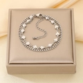 Bracelet double rang en acier inoxydable argenté avec breloques cœur et fermoir réglable - Style Chaîne Cubaine Coeur Plein Argenté (KB210097-Z)