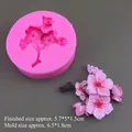 Pink silicone mold featuring detailed cherry blossom design for candles and soap - Plum Blossom / Pink