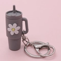 Grey cup shaped silicone keychain with white daisy charm and silver metal ring - Dark Grey Flower Cup Keychain