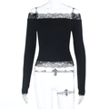Detail of black off-shoulder knit top featuring intricate lace trim on neckline and hem - XS / Black
