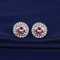 Pink round halo stud earrings featuring central pink stone with white zircon border - Round Halo Pink Zirconia Studs (ED80)