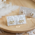 Elegant pearl earring set displayed on a white marble-patterned card with size labels - Cloud Pattern 2-Hole (6x3cm)