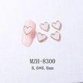 Detalle de adornos para uñas de corazón mármol rosa 8,6x8,8 mm con bordes dorados - 8300 Borde Dorado Mármol Rosa (8,6*8,8mm)