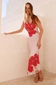 Close-up of summer backless floral maxi dress with vibrant red flower print on light pink fabric - S / White Red Flower