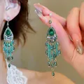 Vintage green tassel earrings with emerald teardrop stones and colorful crystal accents - Green Tassel Style (29#)