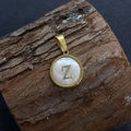 Golden round pendant with natural mother of pearl inlay and letter Z design - Letter Z / 17x20mm