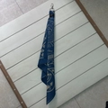 Navy blue nautical bandana featuring beige anchors and a black leather carabiner buckle - With Leather Loop Metal Buckle / Blue