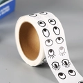 Roll of DIY cartoon eye stickers with various black facial expressions on white paper - Black and White Eyes (Double Row) / 1000 Pieces/Pack