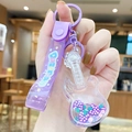 Purple guitar-shaped floating quicksand keychain with stars and berry fillings - Fruit Violin - Grape
