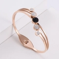 Elegant rose gold three-layer stainless steel bangle featuring sparkling black and white crystals - Rose Gold