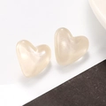 Close-up of translucent cream heart stud earrings in a minimalist jewelry design - Creamy White (Z-364)