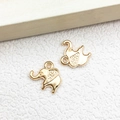 Two golden swan-shaped DIY jewelry pendants with smooth metallic finish and hanging loops - 1pc Elephant Charm