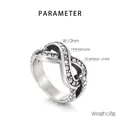 Detailed view of infinity symbol ring with white rhinestones and scale texture band - US 8 / Vintage Silver(KR105244-KJX)