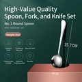 Modern stainless steel round soup spoon weighing 31g on a stylish pink and green pedestal - No.3 Round Spoon