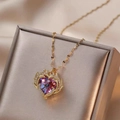 Golden heart necklace with purple crystal and zirconia in a luxury champagne jewelry box - Pink Heart Gold