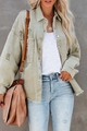 Detailed view of frayed hem and distressed texture on army green denim jacket - L / Tops / Light Green
