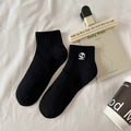 Black cotton crew socks with minimalist panda embroidery and ribbed cuff detailing - Front Panda-Black