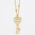 Elegant gold heart key pendant necklace with micro-paved zircons and beaded chain - Heart Key / Gold