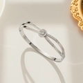 Silver titanium steel roman numeral bangle with central zircon and pavé diamond details - Silver