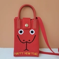 Red woven crossbody phone bag with festive cartoon face and Happy New Year text - Snake Emoji (Red)