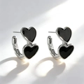 Fashionable silver-toned metal double heart earrings with black enamel inlay - Silver Edge Black Double Heart Stud Earrings