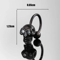 Black stainless steel skull stud earring measuring 0.65cm width by 1.23cm height - Black Skull Shape (S291)