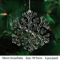 Close-up of 78mm clear acrylic snowflake ornaments hanging on a Christmas tree branch - 78mm Snowflake