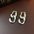 Detail of two-tone gold and silver linked geometric drop earrings on leather surface - 37# Ear Buckle-Gold Silver-Chain Splicing