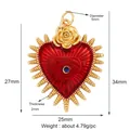 Gold-plated double heart pendant featuring a red eye charm and size measurement data - Red Sacred Heart / Red