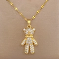 Macro shot of gold teddy bear pendant with sparkling crystals and fine link chain - Gold Full Rhinestone Bowtie Bear (F325)