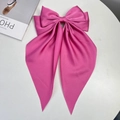 Elegant rose pink satin oversized bow hair clip with long ribbons for women - Lotus Pink