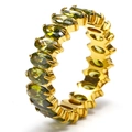 Detail view of oval cut olive green zircon stones on 18k gold plated eternity ring band - Gold + Olive Green Zirconia