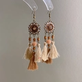 Detail of bohemian sunflower tassel earrings with brown beads and ethnic fringe - 14# Hook Coffee