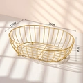 Golden oval iron fruit basket with dimensions 25cm length, 17cm width and 7cm height - Small / Gold