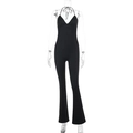 Sexy schwarzer Neckholder-Jumpsuit mit rückenfreiem Design und ausgestelltem Bein - S / Schwarz