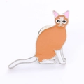 Detailed view of orange and white alloy cat brooch with silver-toned metal edges - Long Tail Brown Cat
