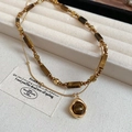 Λεπτομέρεια από χάντρες μάτι της τίγρης και χρυσό μενταγιόν σε σετ κοσμημάτων - Στυλ Σύνδεσης Γεωμετρικής Ορθογώνιας Χάντρας (3# Κολιέ-Χρυσό-Καφέ-Πραγματική Επιχρύσωση)