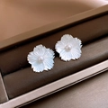 Detailed view of elegant flower earrings with mother of pearl petals and pearl center - Shell Five-Petal Flower Pearl Stud Earrings (9#)