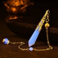 Light blue hexagonal crystal pendant with gold filigree and matching chain - Gold Opalite