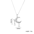Collana in acciaio al titanio argento con ciondoli farfalla, luna, perla e zircone - Trasparente (Argento)