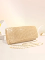 Macro view of golden pleated glitter evening clutch bag with fine metal chain strap - Champagne