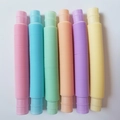 Detailed set of six colorful flexible plastic pop tubes in vibrant neon colors for kids - Macaron Pink / 17mm Diameter