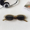 Occhiali da sole ovali vintage con montatura ambra trasparente e lenti scure alla moda - verde oliva