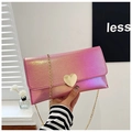 Detail of pink gradient metallic purse with heart-shaped gold buckle and chain - Rose Red